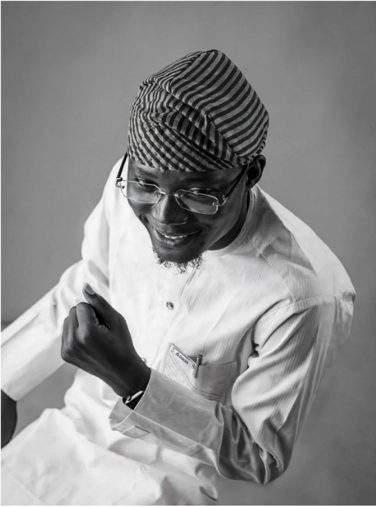 Kayode Hamzat smiling, in traditional dress
